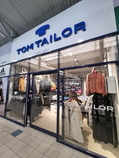 Фото компанії Том Тейлор