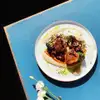 Логотип компанії Nomad Neo Bistro