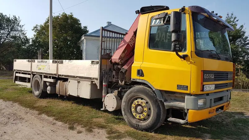 Фото компанії Евакуатор та кран-маніпулятор