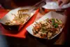 Логотип компанії Woka Asia food